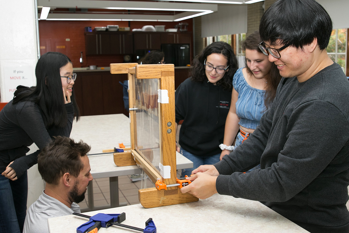 CEE graduate students work on project in lab at CMU
