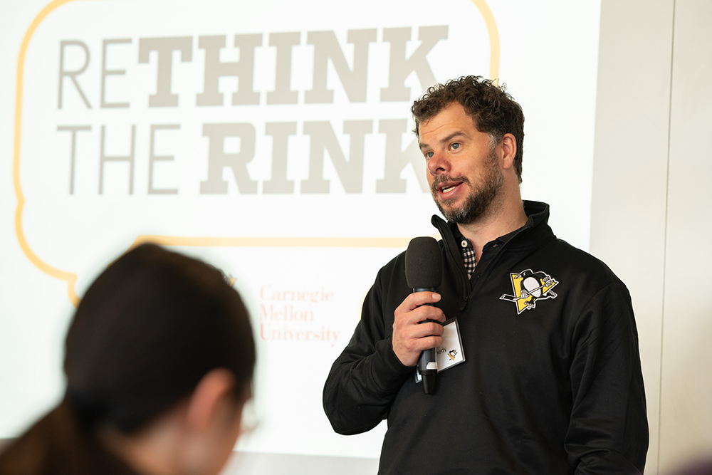 Penguins representative presents to students during the 2024 Rethink the Rink Make-a-thon