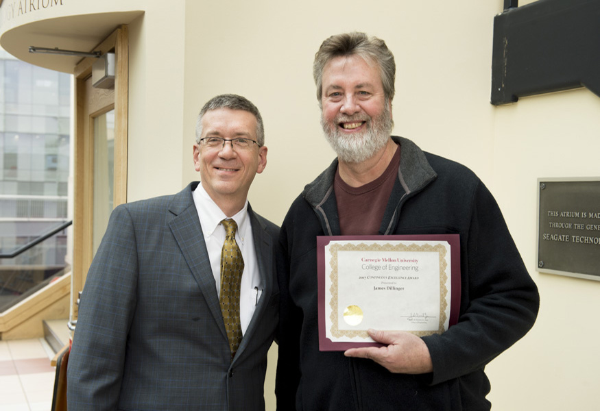 Continuous Excellence Award winner James Dillinger with Dean Garrett