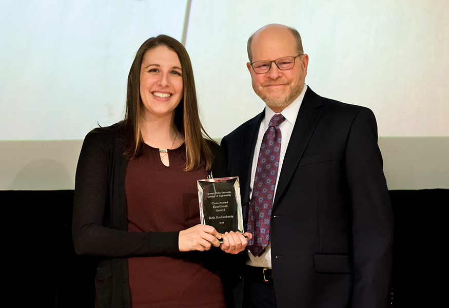 Continuous Excellence Award winner Beth Hockenberry (The Department of Civil and Environmental Engineering) with Interim Dean Jon Cagan.